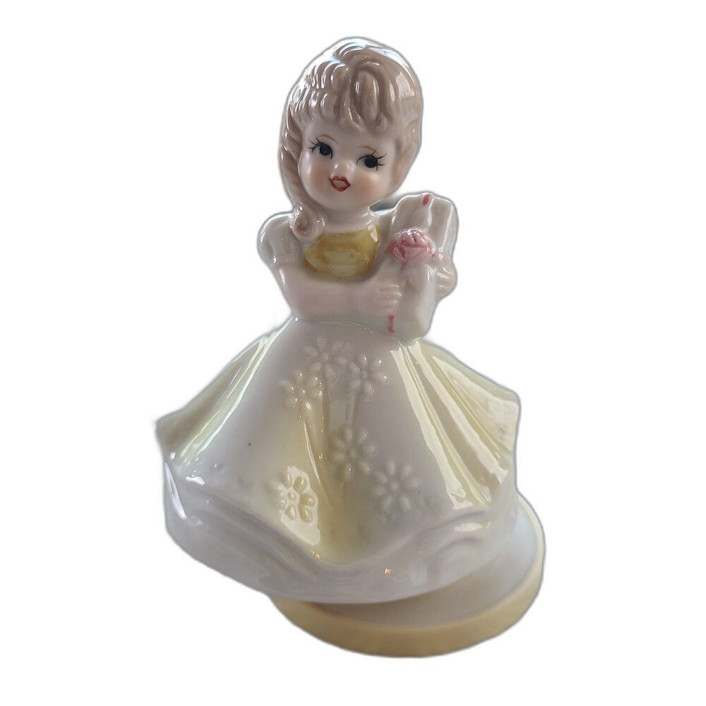 RARE Music Box Figurine With Lovely Young Girl Holding A Gift Plays Look Of Love